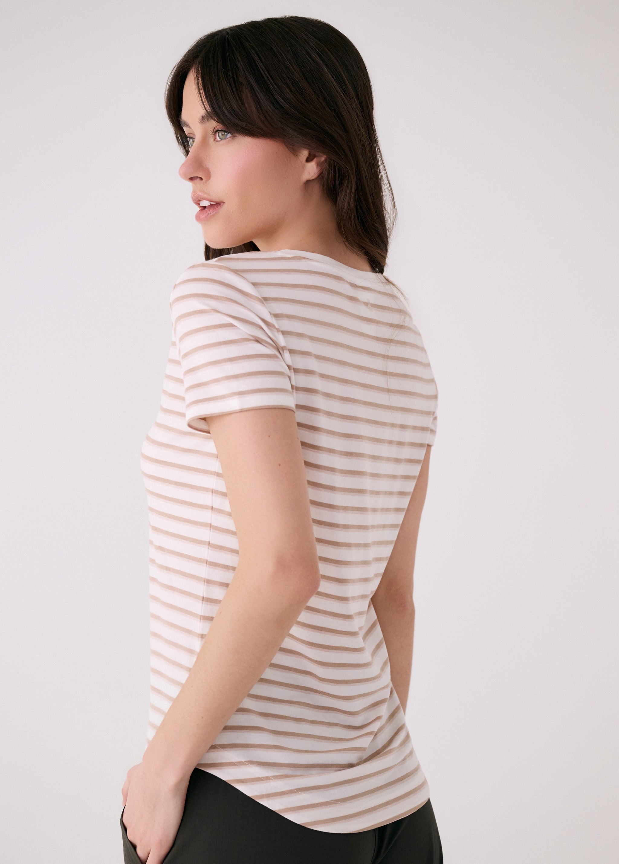 Lolë Dynamic V-neck in white — this V-neck tee proves that everyday essentials can still feel special