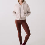 Lolë Yonder Full Zip Hoodie in Abalone pale greige — cropped and cozy, the Yonder Hoodie is your cold-weather comfort zone
