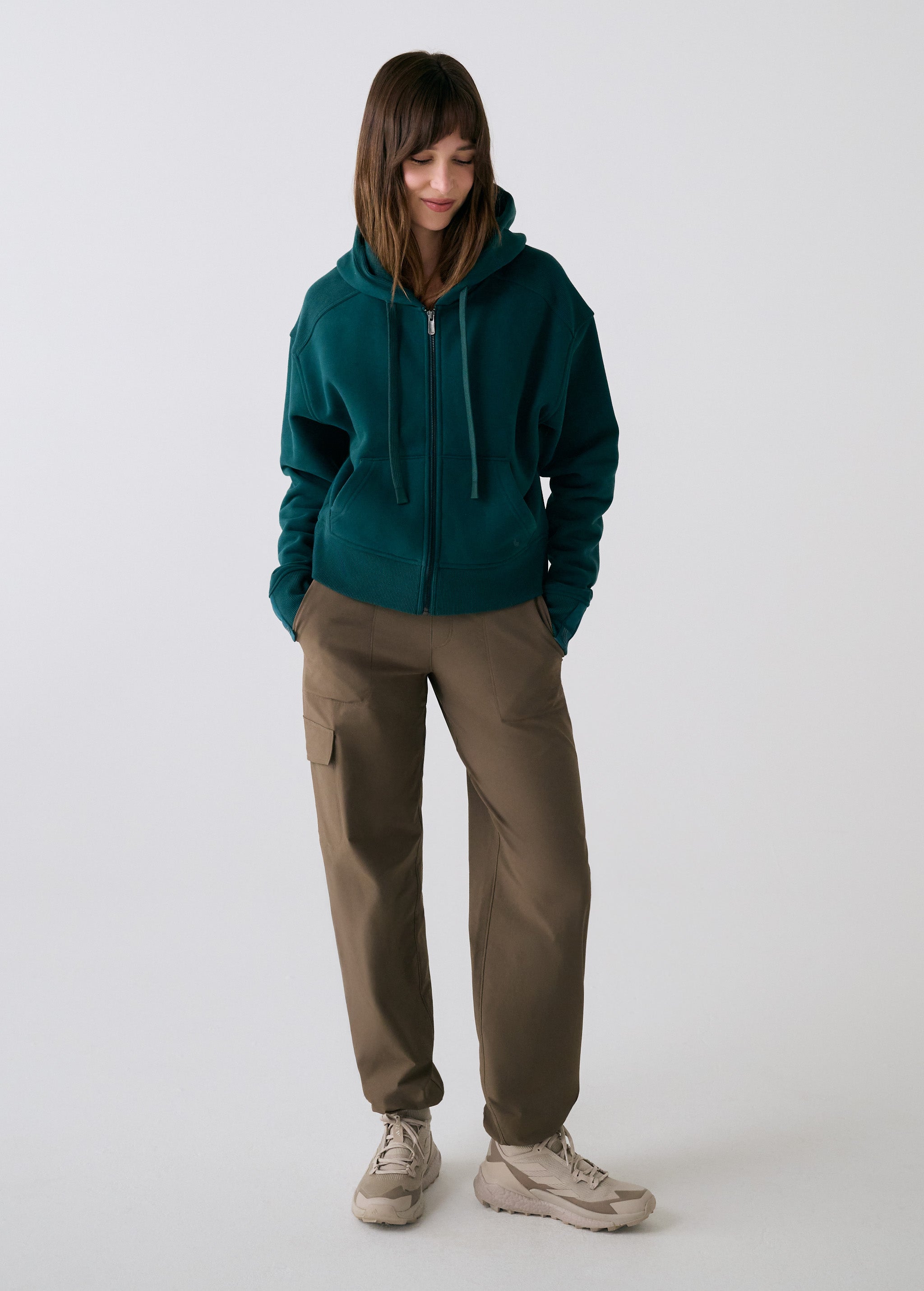 Lolë Yonder Full Zip Hoodie in teal — cropped and cozy, the Yonder Hoodie is your cold-weather comfort zone