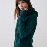 Lolë Yonder Full Zip Hoodie in teal — cropped and cozy, the Yonder Hoodie is your cold-weather comfort zone