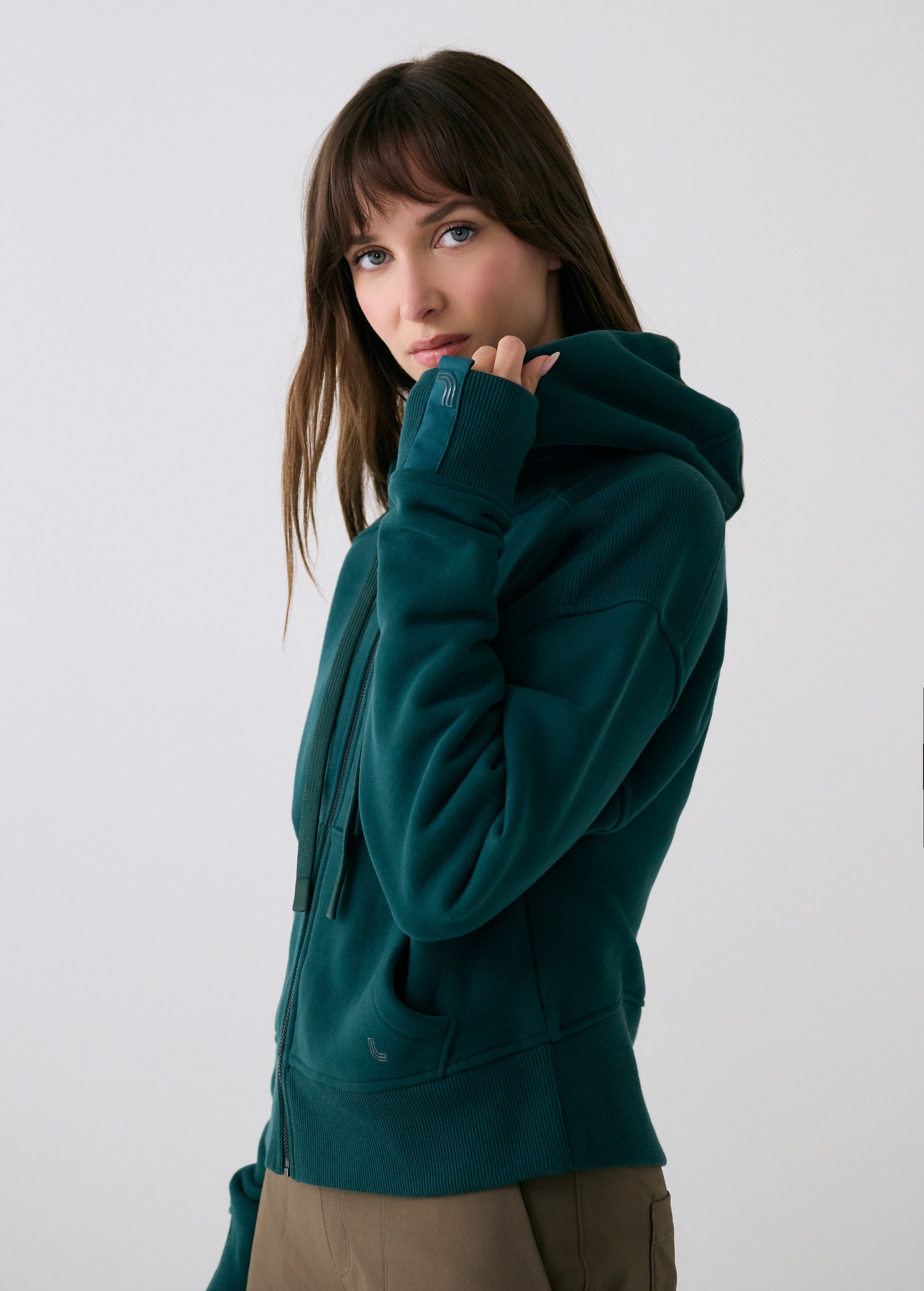 Lolë Yonder Full Zip Hoodie in teal — cropped and cozy, the Yonder Hoodie is your cold-weather comfort zone