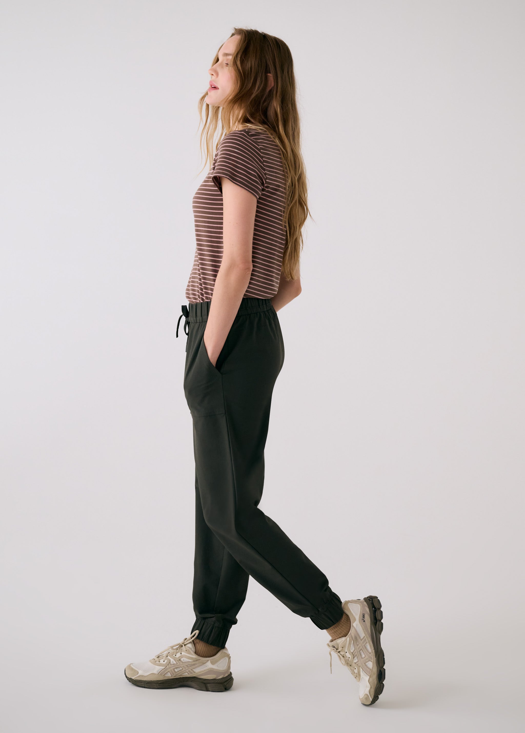 Lolë Olivie Tech Joggers in olive — if features a regular rise and relaxed fit with adjustable waistband