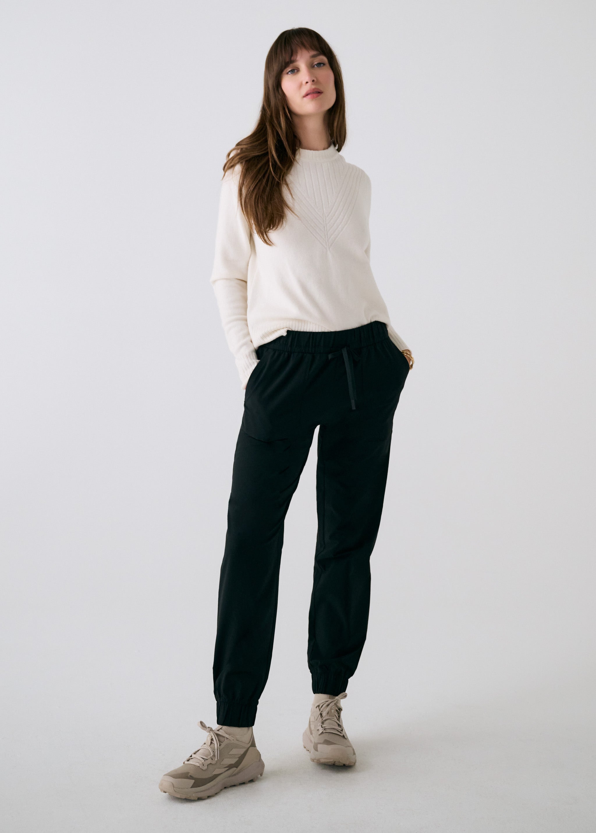 Lolë Olivie Tech Joggers in black — if features a regular rise and relaxed fit with adjustable waistband