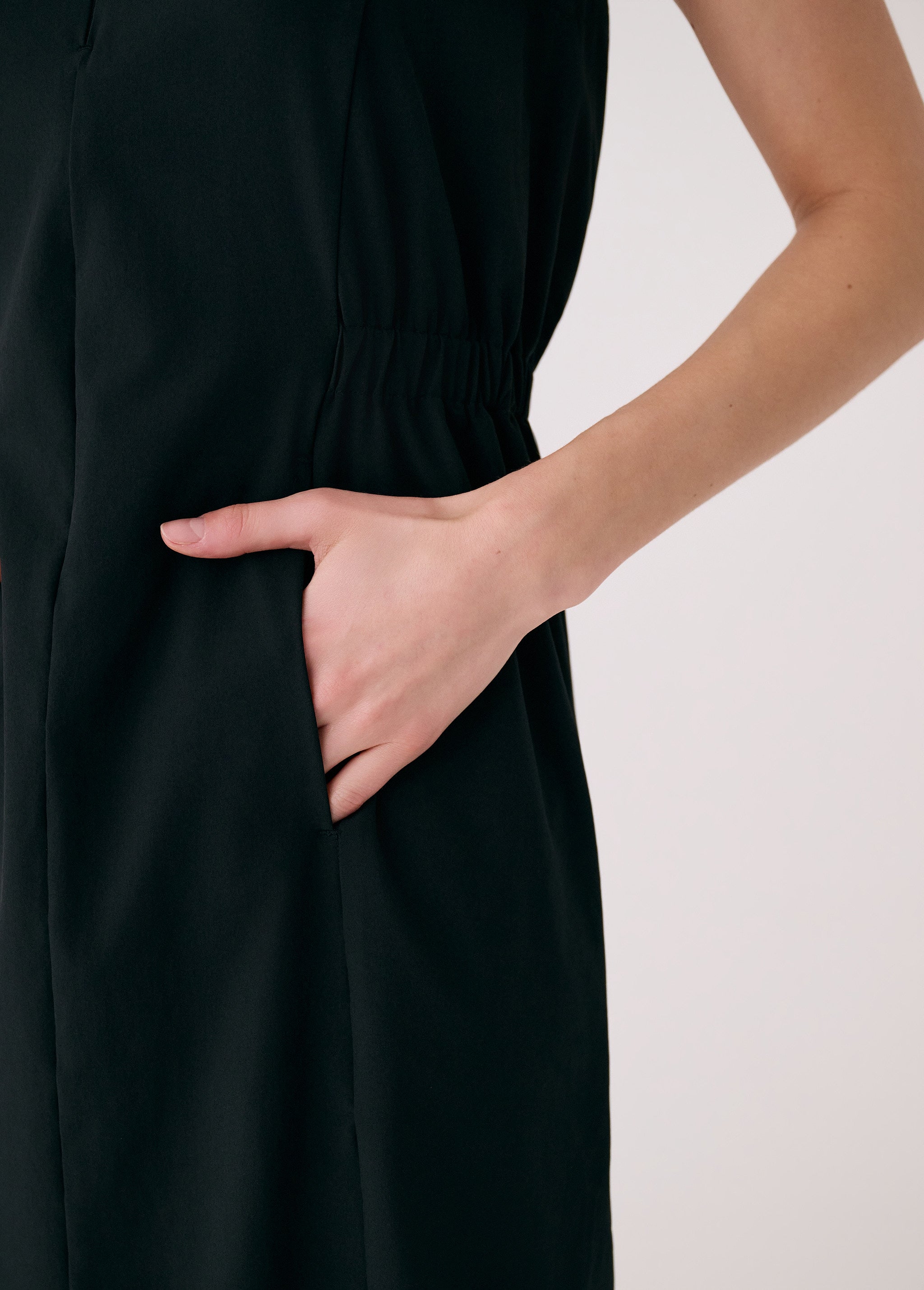 Lolë Olivie Shirt Dress in black — a sporty take on a classic shirt dress