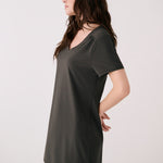 Lolë Olivie V-neck t-shirt dress in olive, side view showing the relaxed shift silhouette