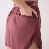 Lolë Sofia Active Short in Mauveberry dusty rose — pick up the pace in the Sofia Active Short