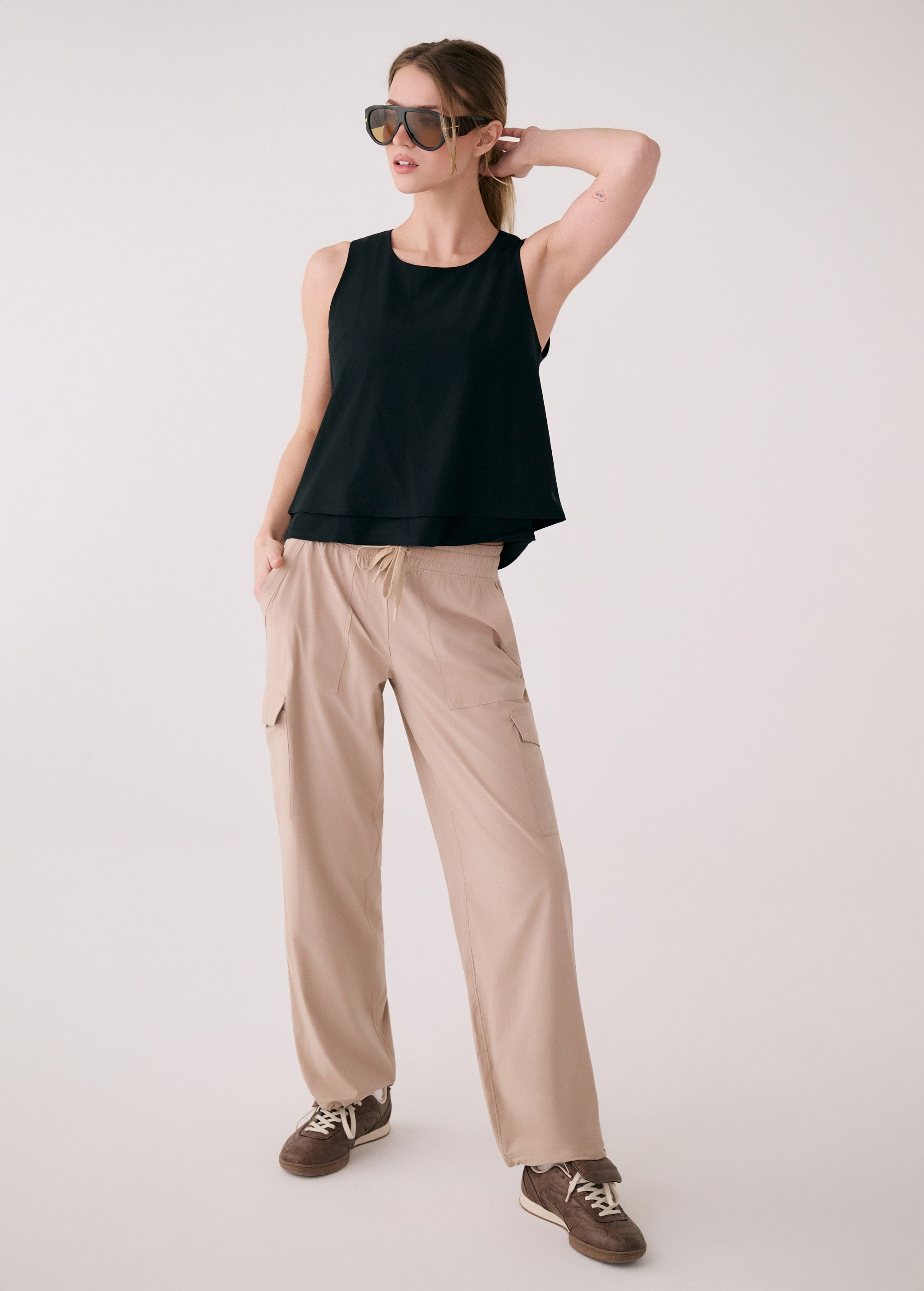 Lolë Olivie Layered Tank in black — a tank top with a little extra dimension