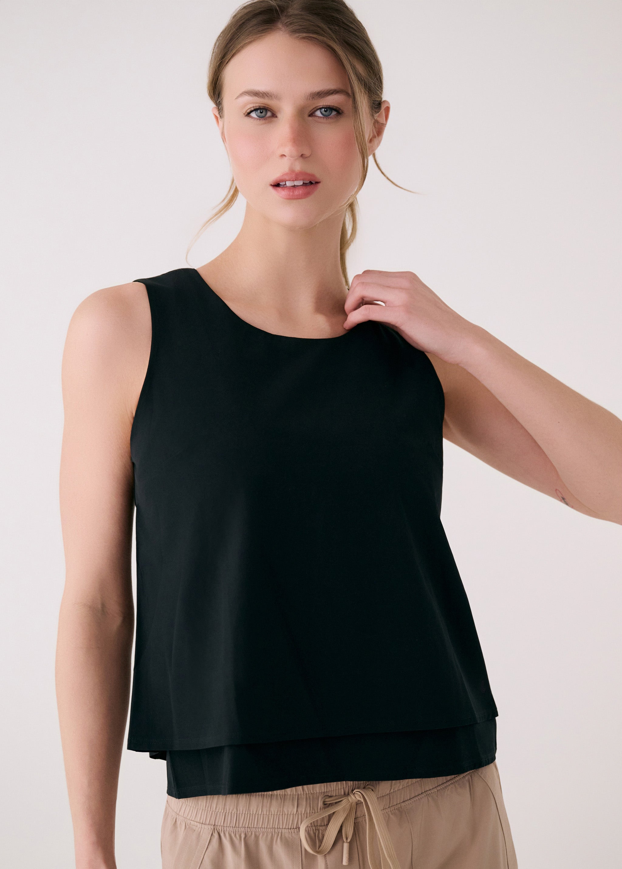Lolë Olivie Layered Tank in black — a tank top with a little extra dimension
