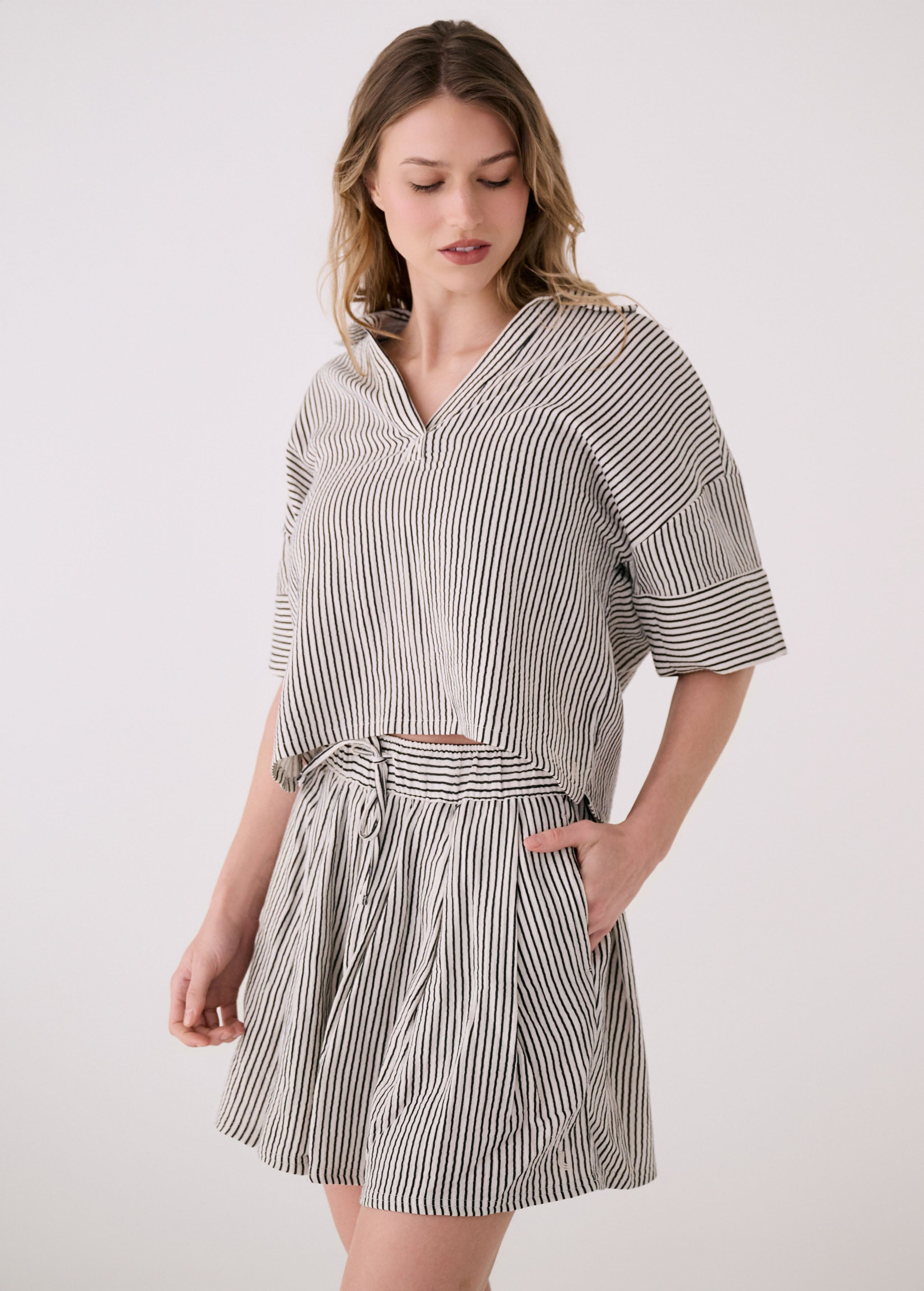 Lolë Bella Skirt in black stripe — an effortless cotton skirt with a relaxed, polished feel