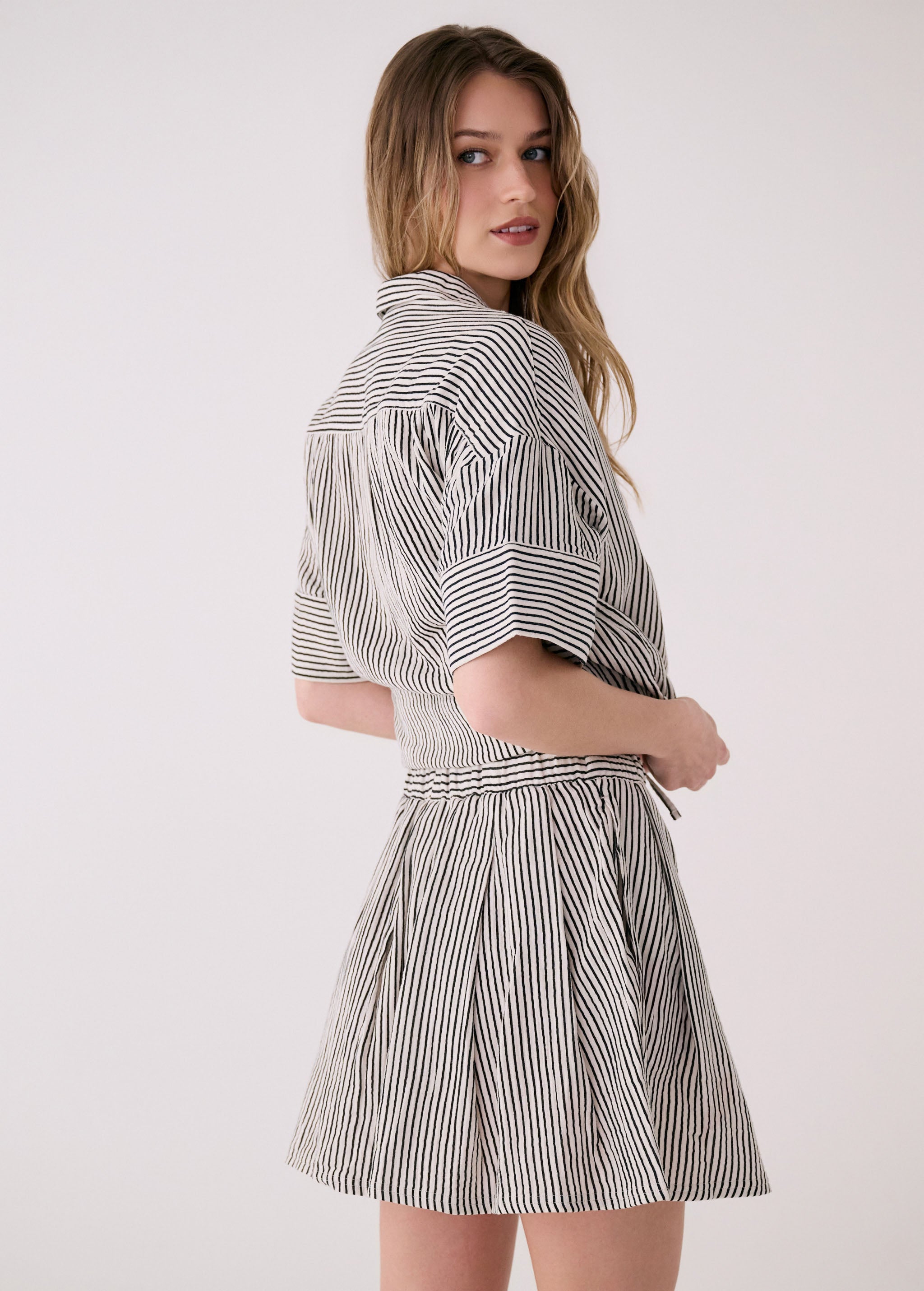 Lolë Bella Skirt in black stripe — an effortless cotton skirt with a relaxed, polished feel