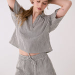 Lolë Bella Shorts in black stripe — a relaxed cotton short that balances comfort with a polished attitude