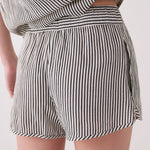 Lolë Bella Shorts in black stripe — a relaxed cotton short that balances comfort with a polished attitude