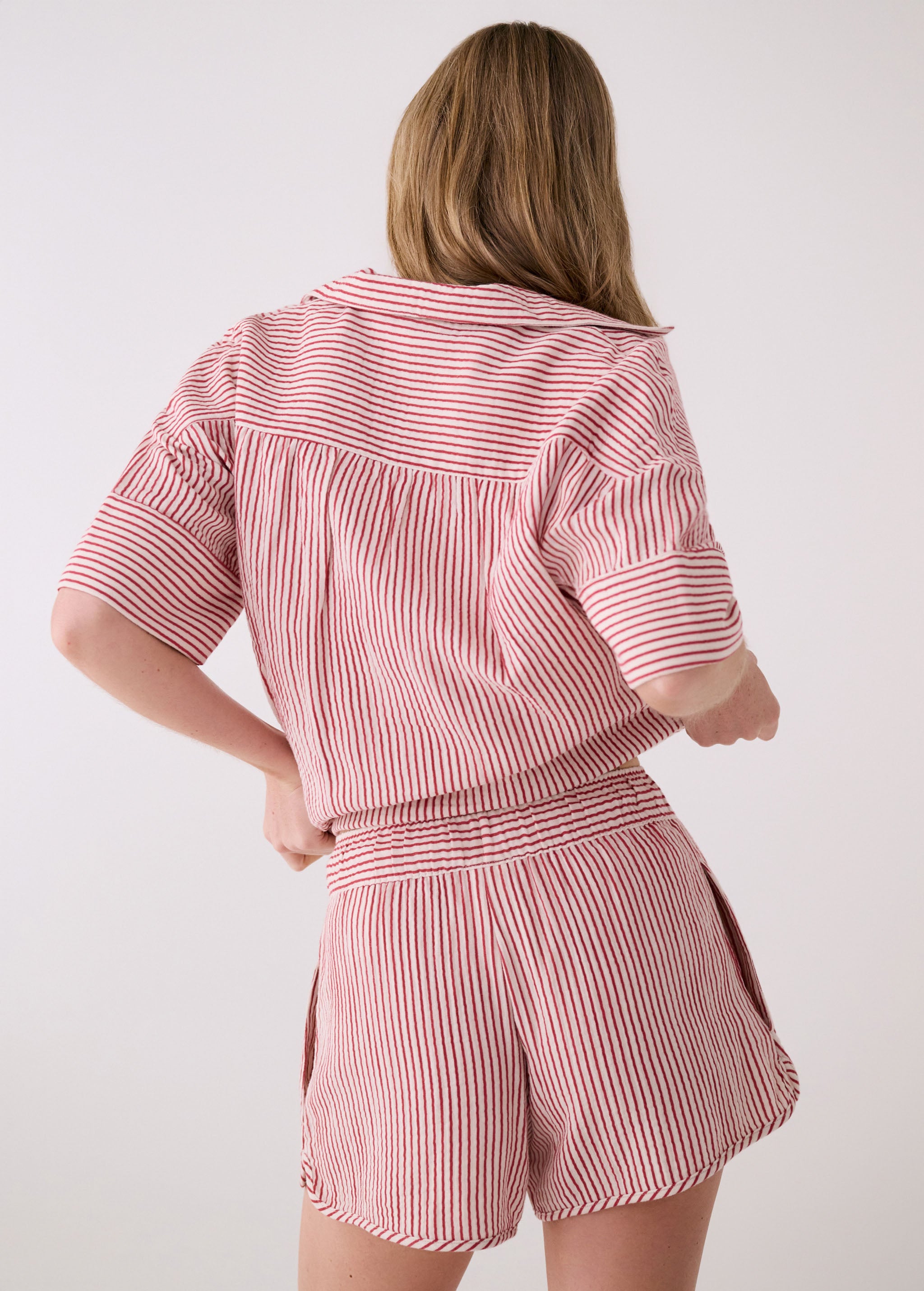 Lolë Bella Shorts in pink stripe — a relaxed cotton short that balances comfort with a polished attitude