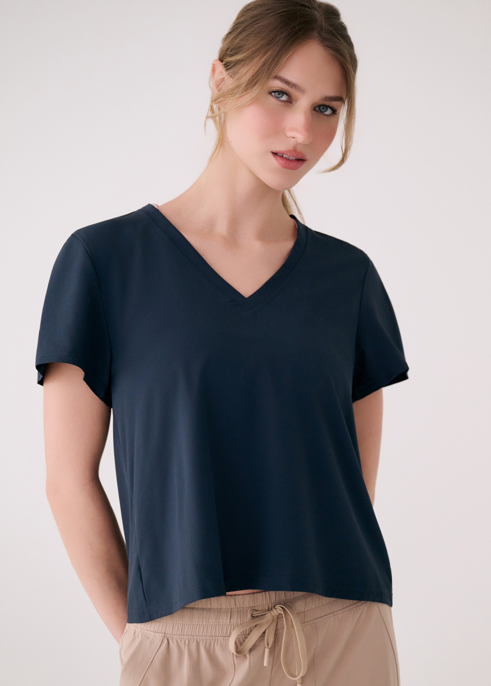 Lolë Olivie V-neck in Outerspace navy — your go-to V-neck with a little extra ease built in