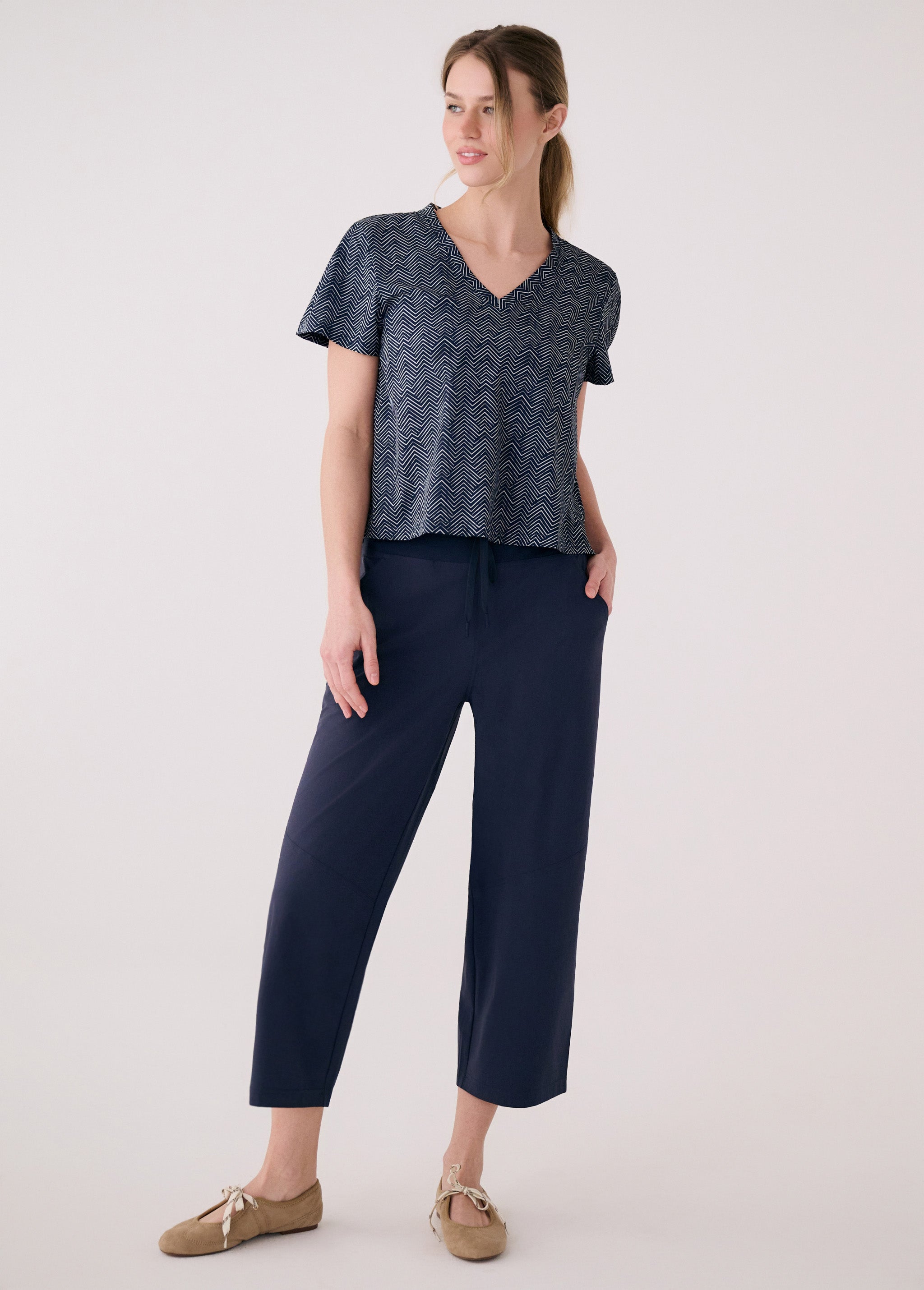 Lolë Olivie V-neck in navy print — your go-to V-neck with a little extra ease built in