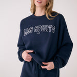 Lolë College Crew Neck Pullover in Outerspace navy — the College Crewneck pairs a relaxed fit with a soft, cozy feel