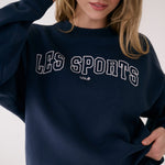 Lolë College Crew Neck Pullover in Outerspace navy — the College Crewneck pairs a relaxed fit with a soft, cozy feel