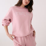 Lolë College Crew Neck Pullover in Ballerina blush pink — the College Crewneck pairs a relaxed fit with a soft, cozy feel