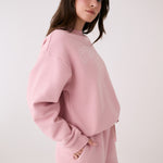 Lolë College Crew Neck Pullover in Ballerina blush pink — the College Crewneck pairs a relaxed fit with a soft, cozy feel