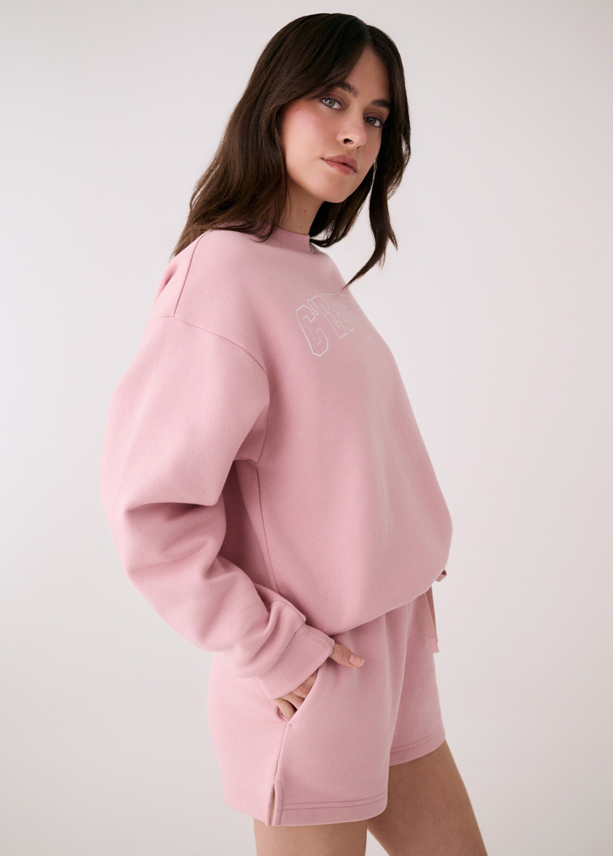 Lolë College Crew Neck Pullover in Ballerina blush pink — the College Crewneck pairs a relaxed fit with a soft, cozy feel