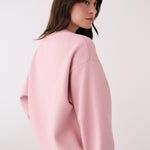 Lolë College Crew Neck Pullover in Ballerina blush pink — the College Crewneck pairs a relaxed fit with a soft, cozy feel