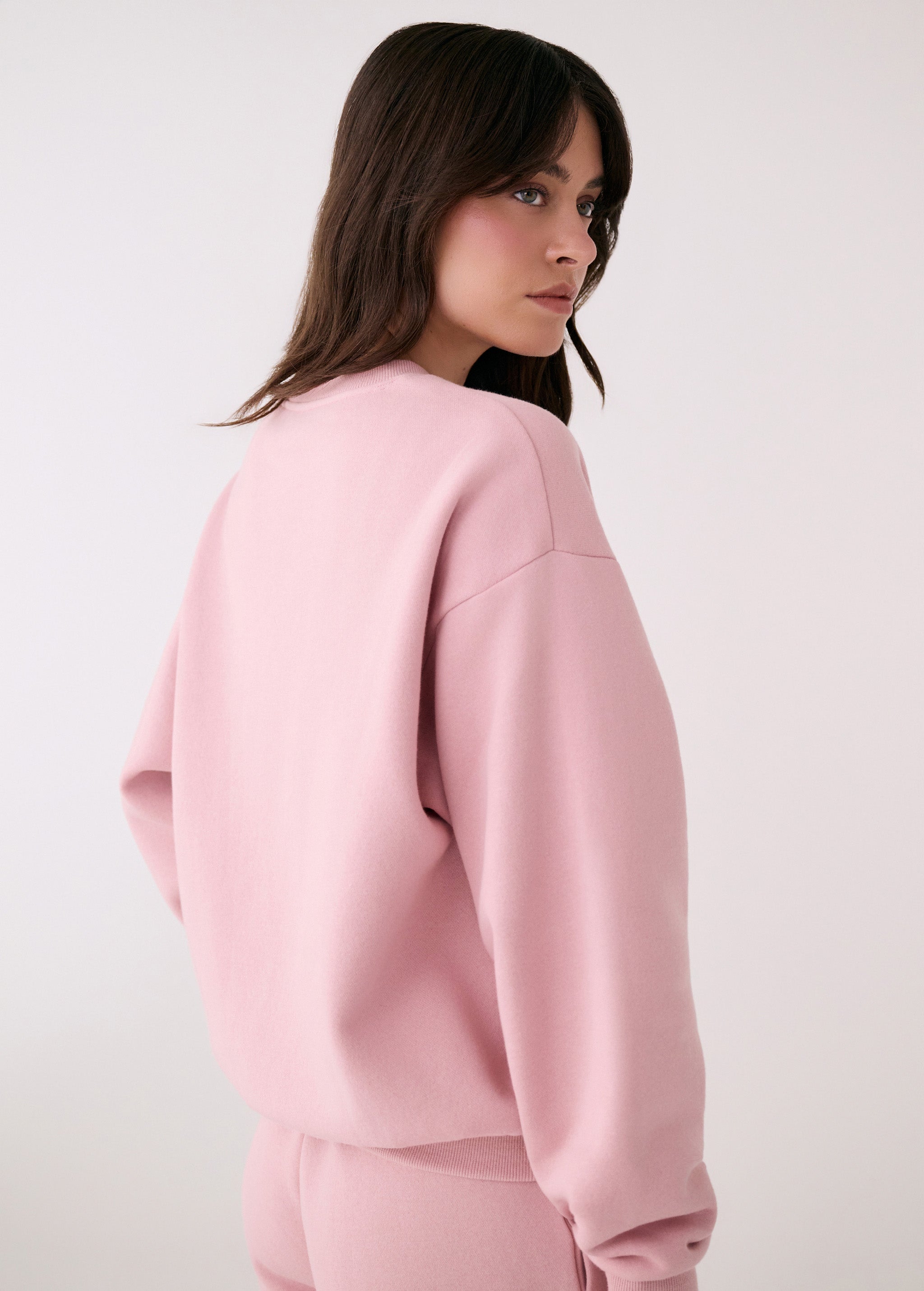 Lolë College Crew Neck Pullover in Ballerina blush pink — the College Crewneck pairs a relaxed fit with a soft, cozy feel
