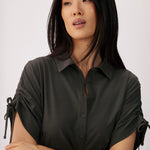 Lolë Momentum Shirt Dress in olive — a polished shirt dress with a Lolë twist