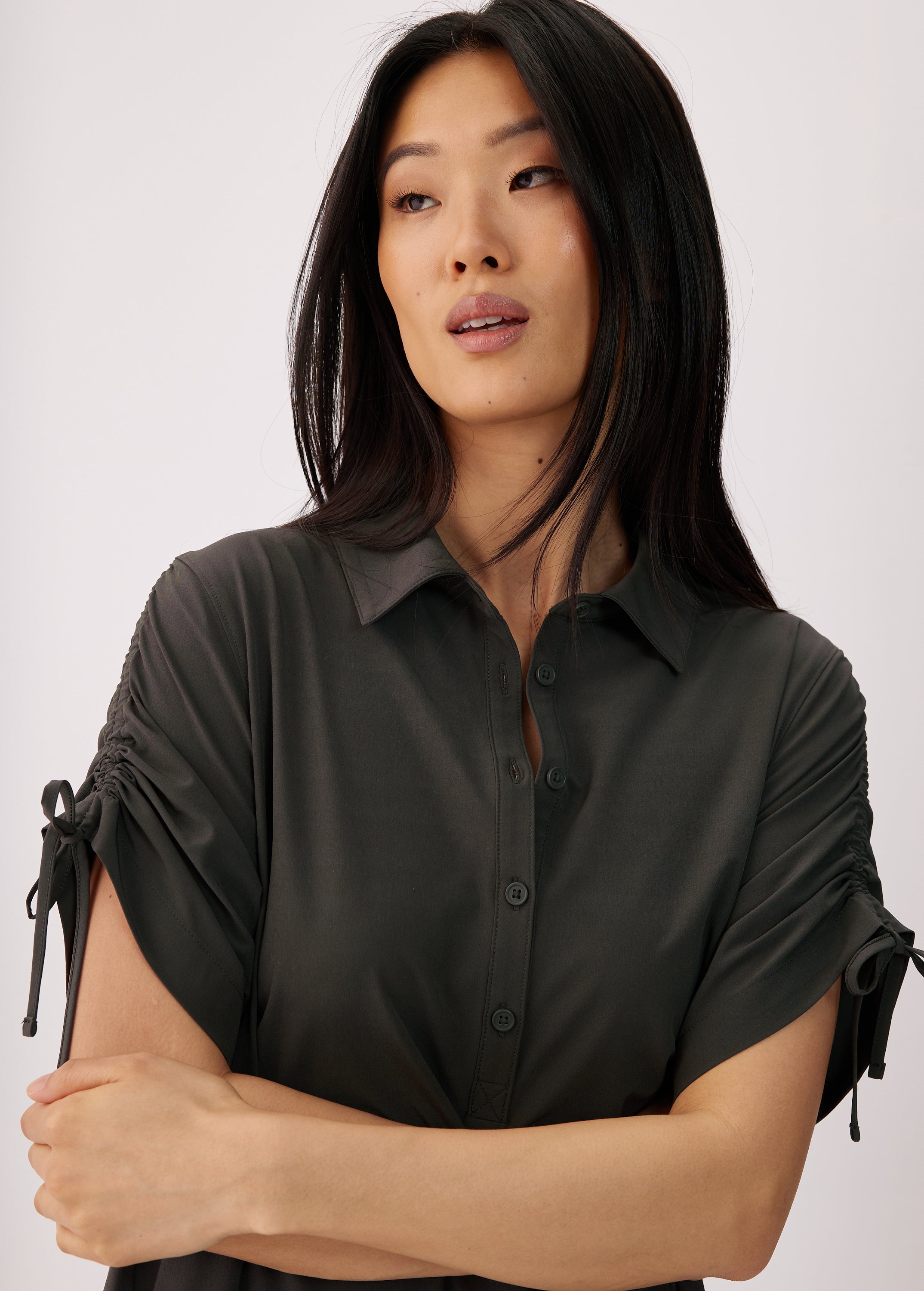Lolë Momentum Shirt Dress in olive — a polished shirt dress with a Lolë twist