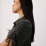 Lolë Momentum Shirt Dress in olive — a polished shirt dress with a Lolë twist