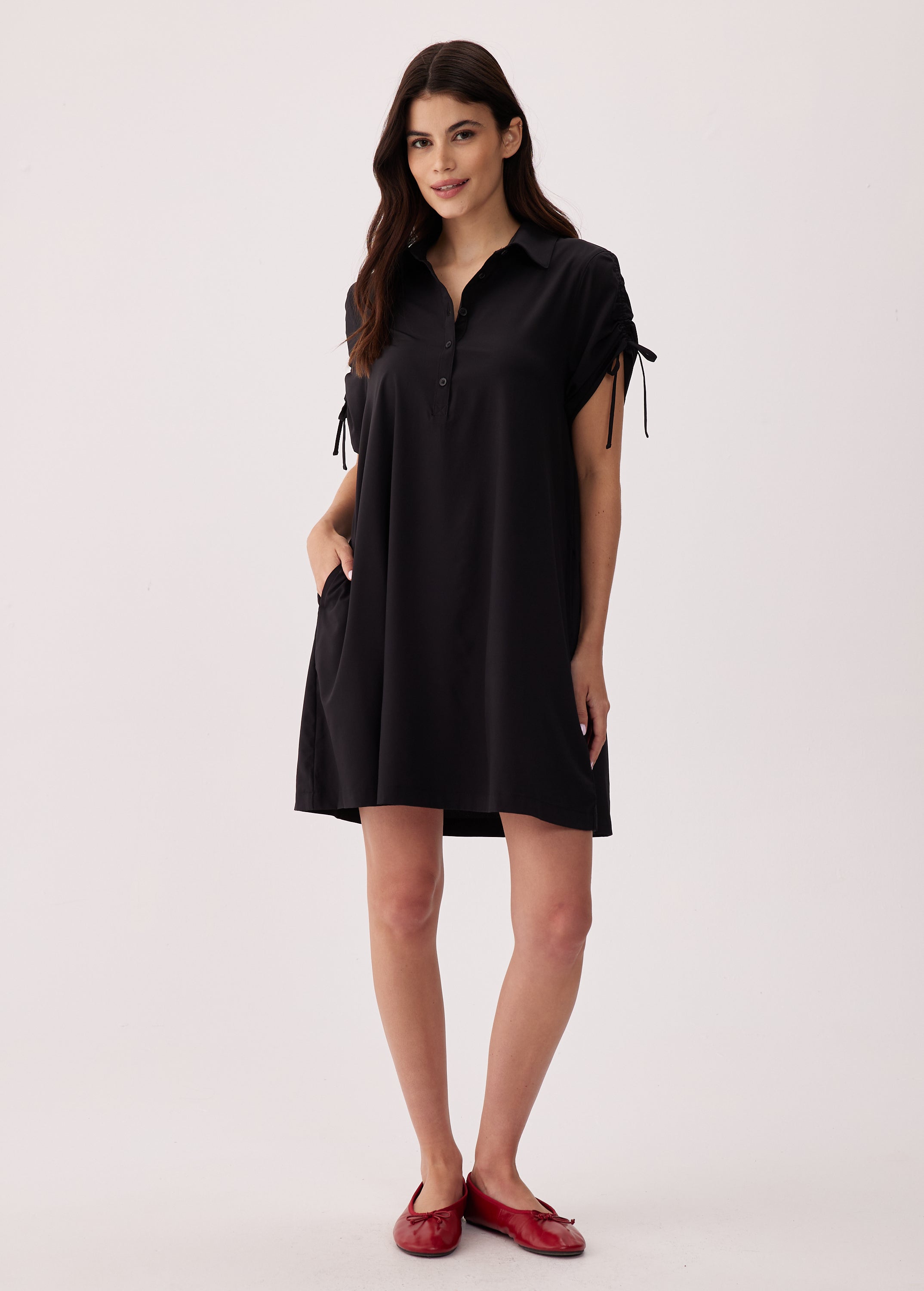 Lolë Momentum Shirt Dress in black — a polished shirt dress with a Lolë twist
