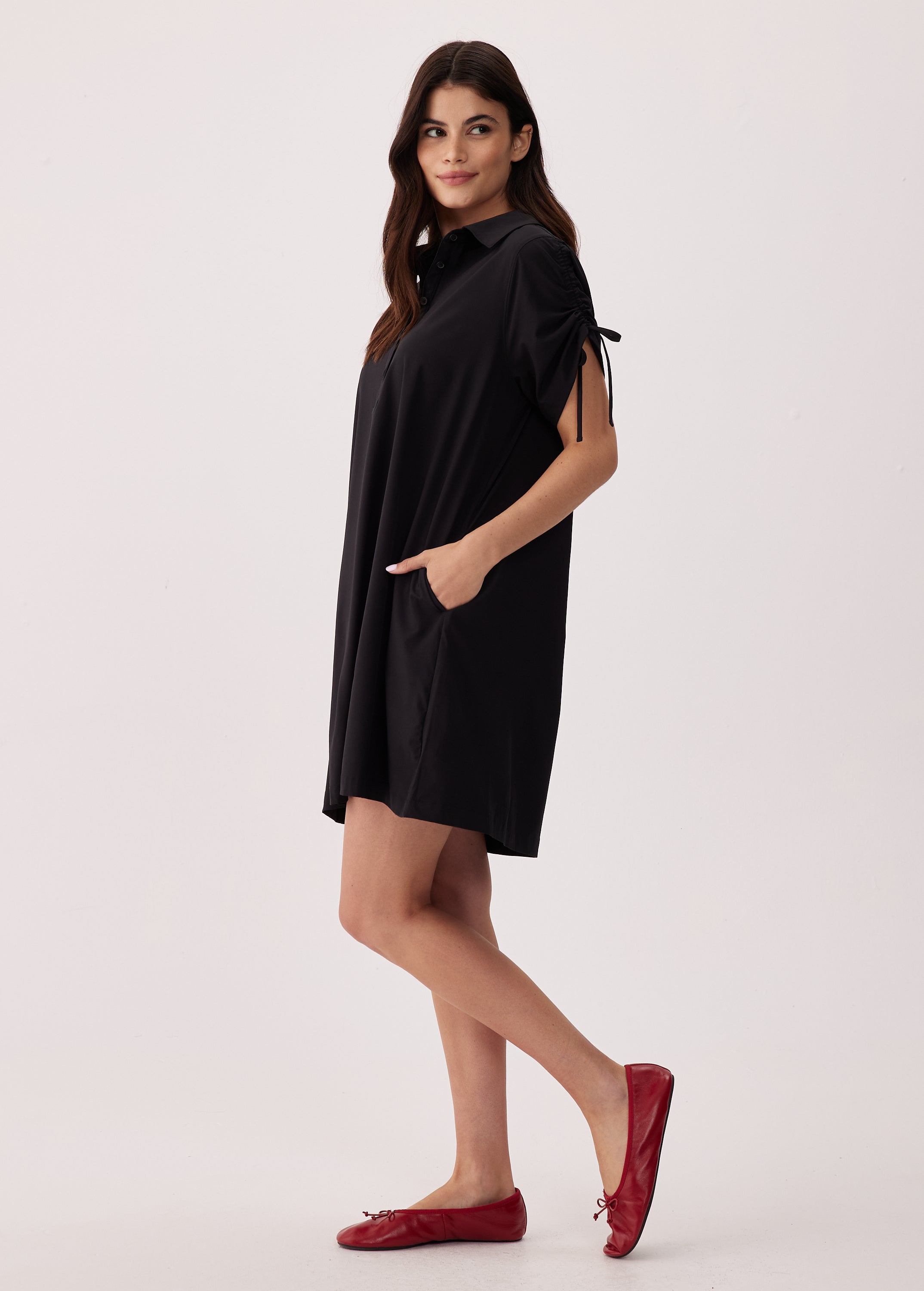 Lolë Momentum Shirt Dress in black — a polished shirt dress with a Lolë twist