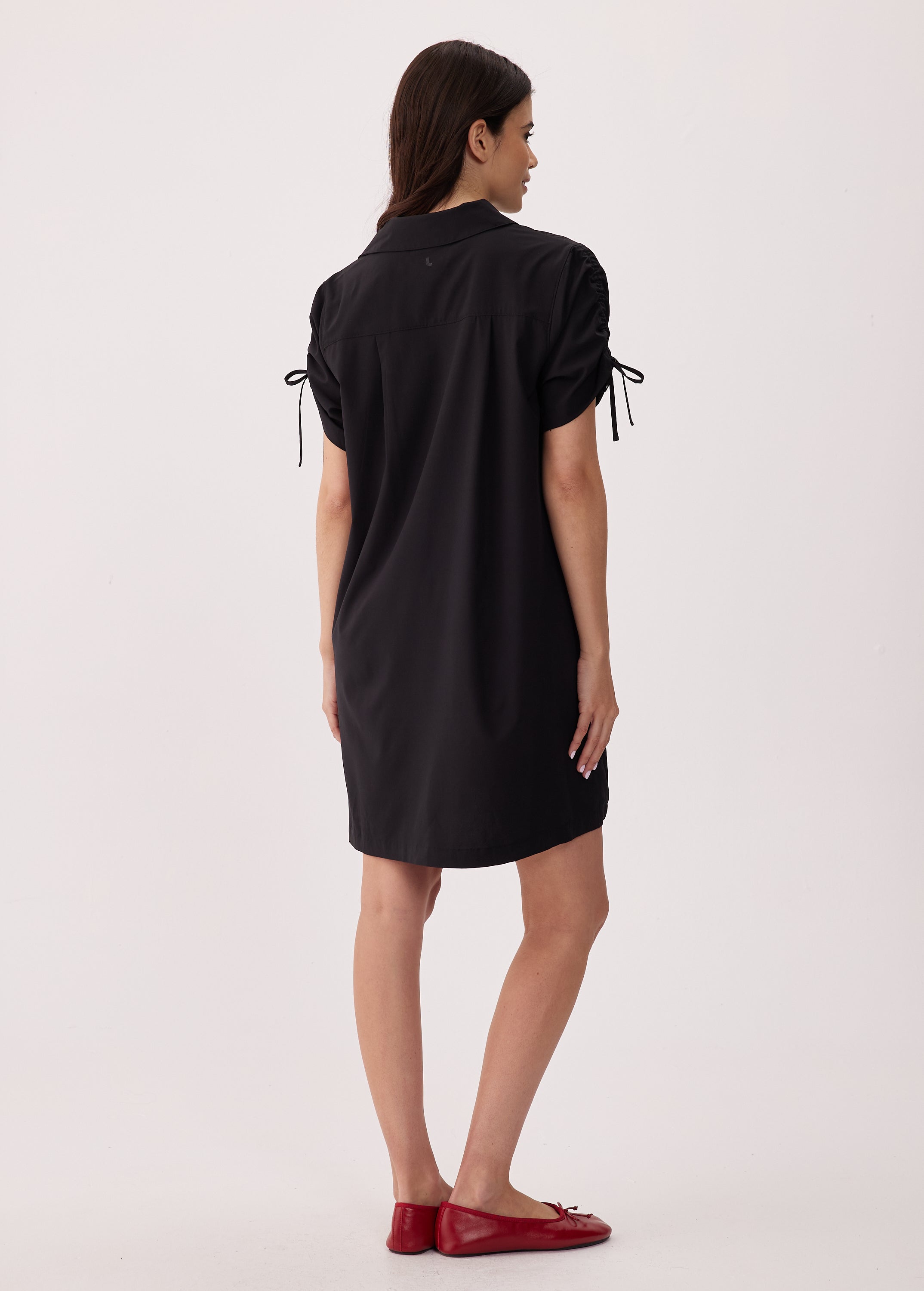 Lolë Momentum Shirt Dress in black — a polished shirt dress with a Lolë twist