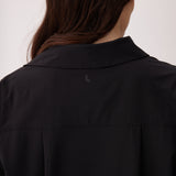 Lolë Momentum Shirt Dress in black — a polished shirt dress with a Lolë twist