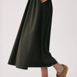 Lolë Momentum Ruched Midi Dress in olive — the dress that gets you out the door faster than your morning coffee