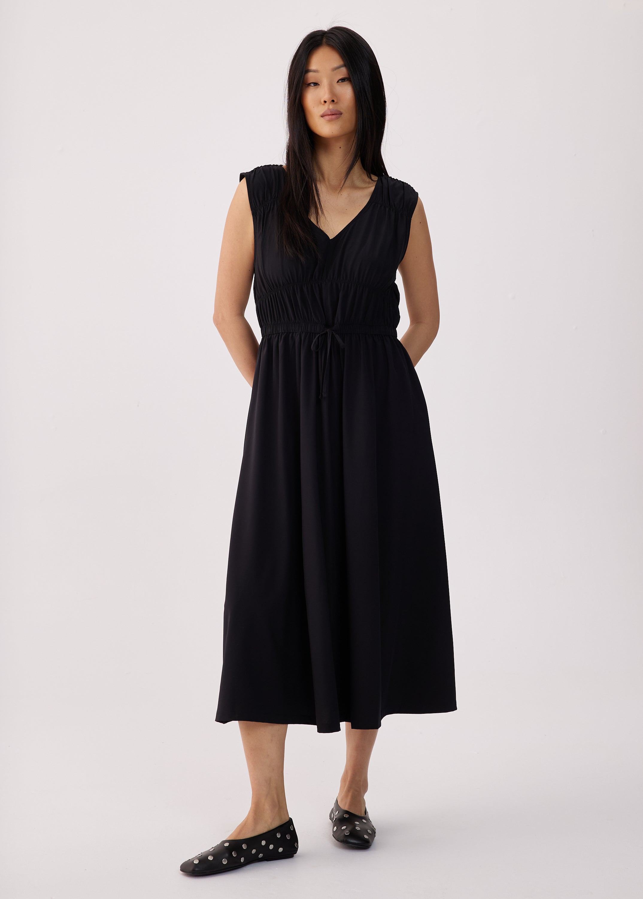 Lolë Momentum Ruched Midi Dress in black — the dress that gets you out the door faster than your morning coffee