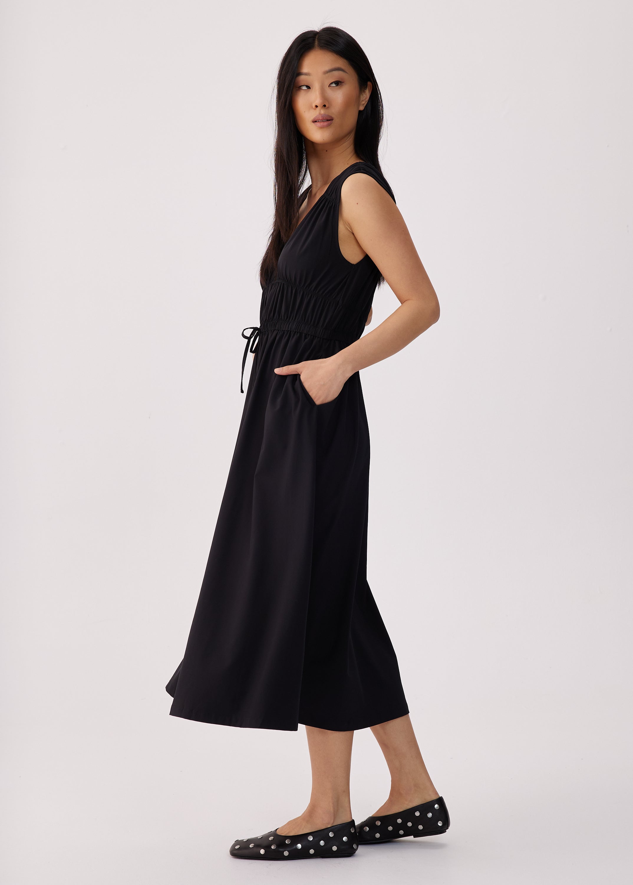 Lolë Momentum Ruched Midi Dress in black — the dress that gets you out the door faster than your morning coffee