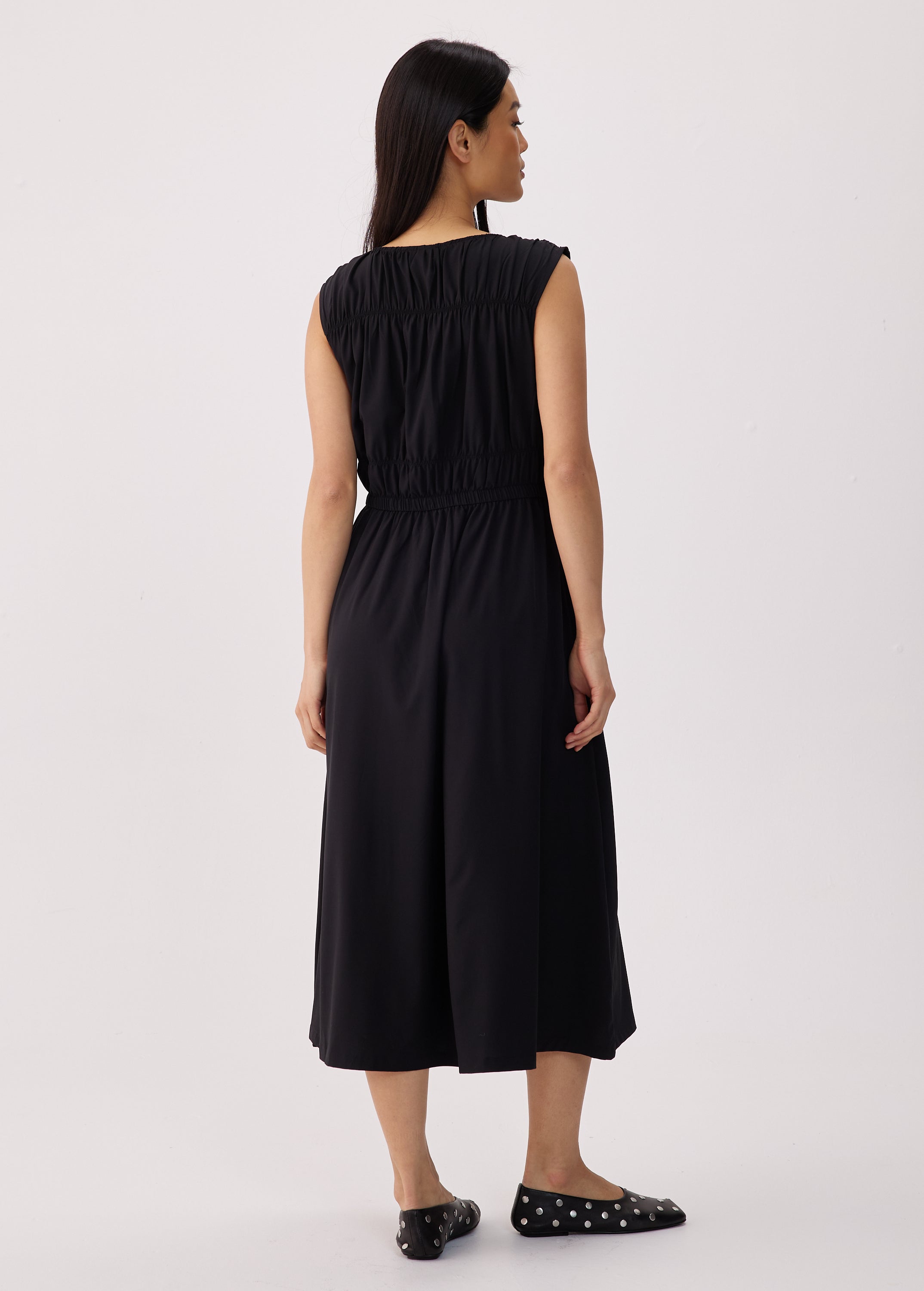 Lolë Momentum Ruched Midi Dress in black — the dress that gets you out the door faster than your morning coffee