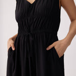 Lolë Momentum Ruched Midi Dress in black — the dress that gets you out the door faster than your morning coffee