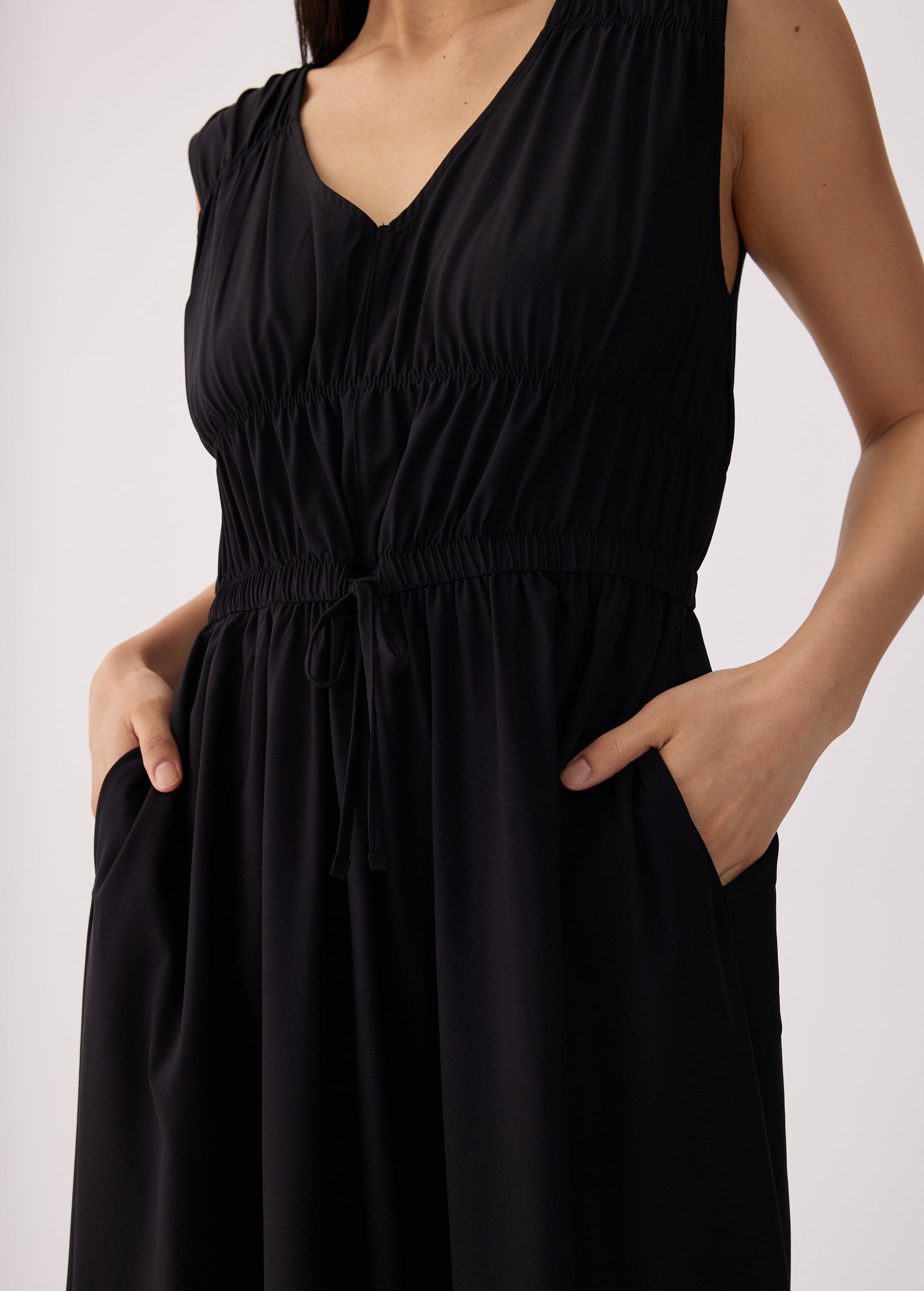 Lolë Momentum Ruched Midi Dress in black — the dress that gets you out the door faster than your morning coffee