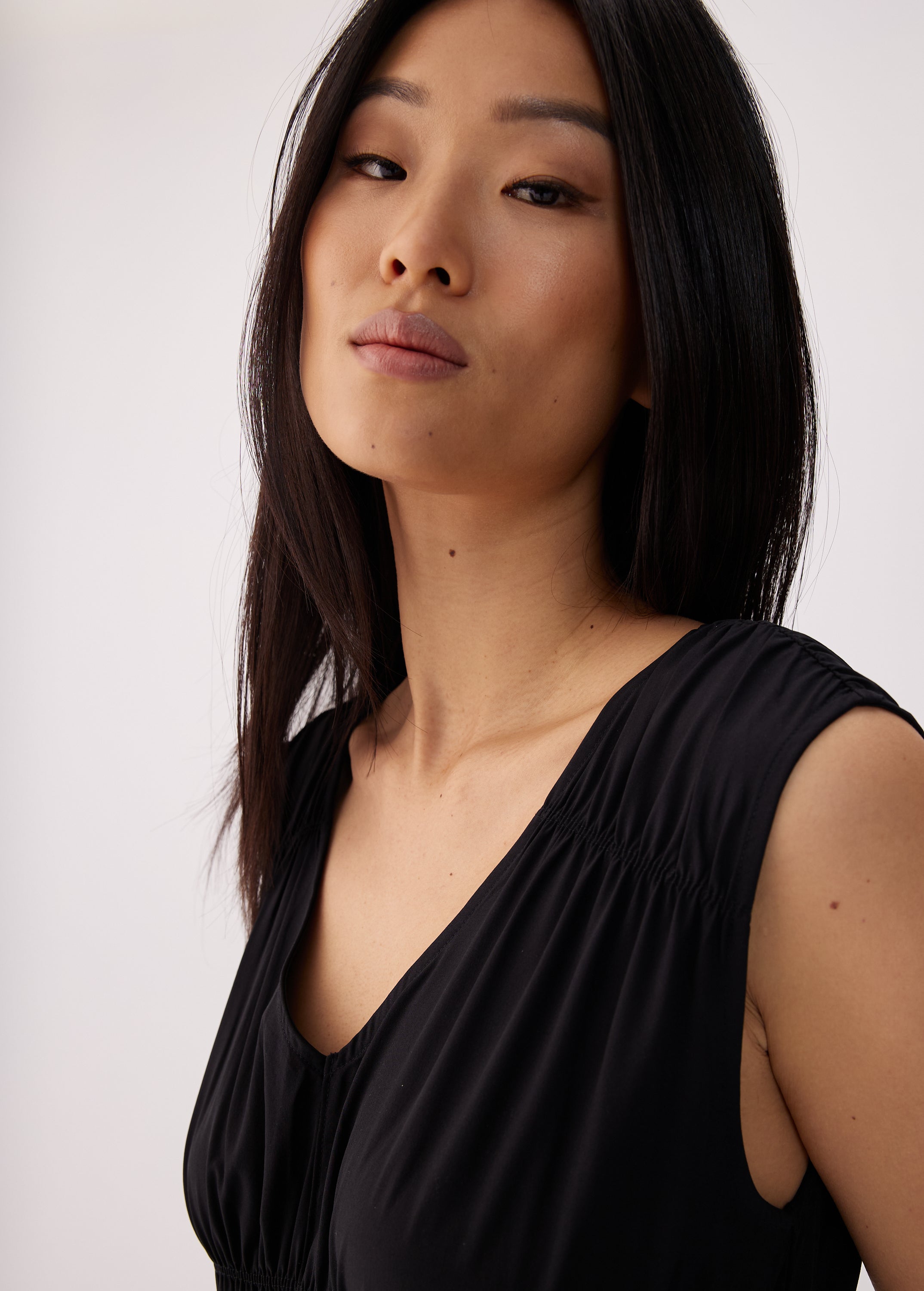 Lolë Momentum Ruched Midi Dress in black — the dress that gets you out the door faster than your morning coffee