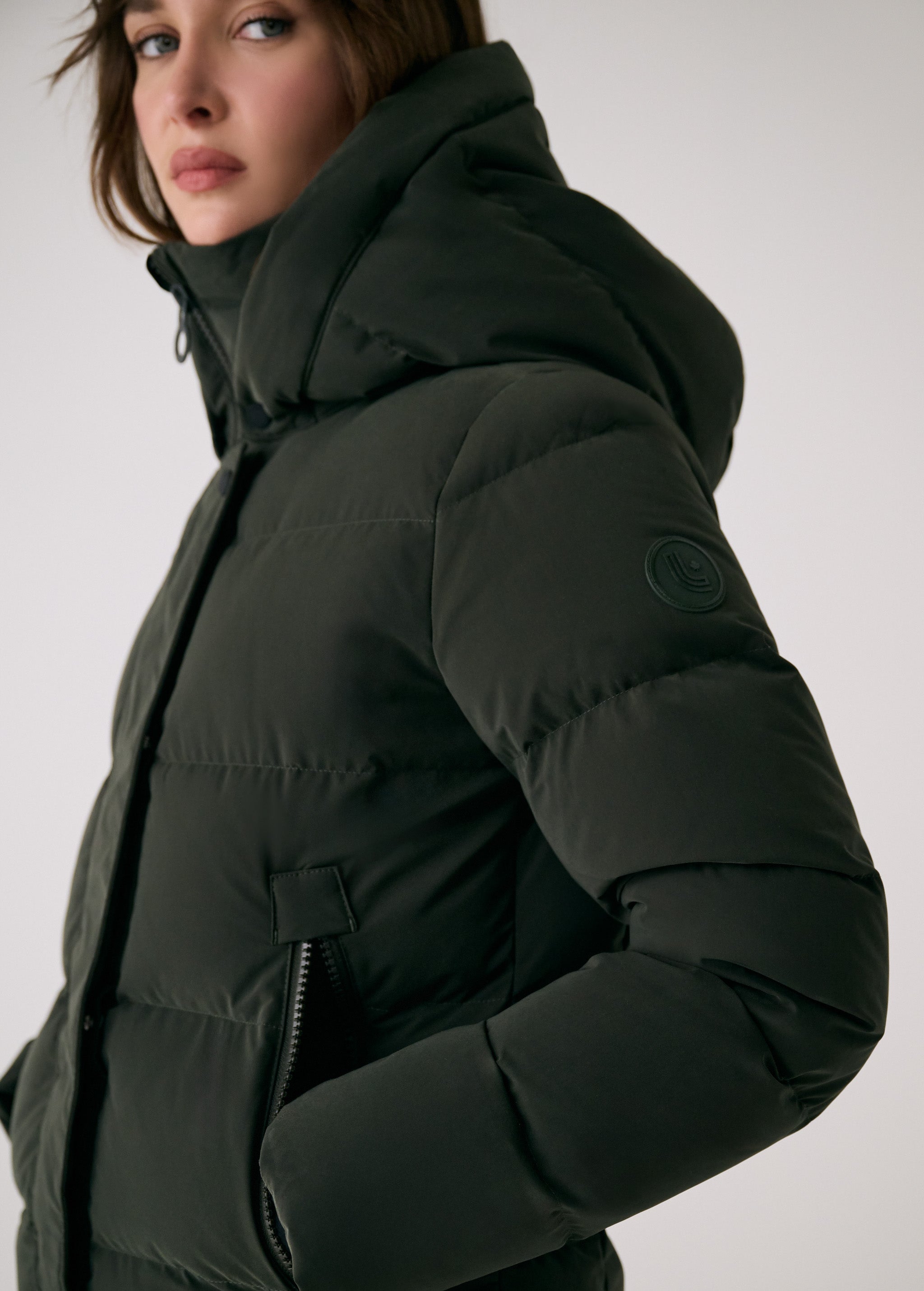 Lolë Après Down Winter Jacket in olive — achieve full-body warmth with this longline city jacket