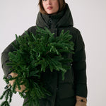 Lolë Après Down Winter Jacket in olive — achieve full-body warmth with this longline city jacket