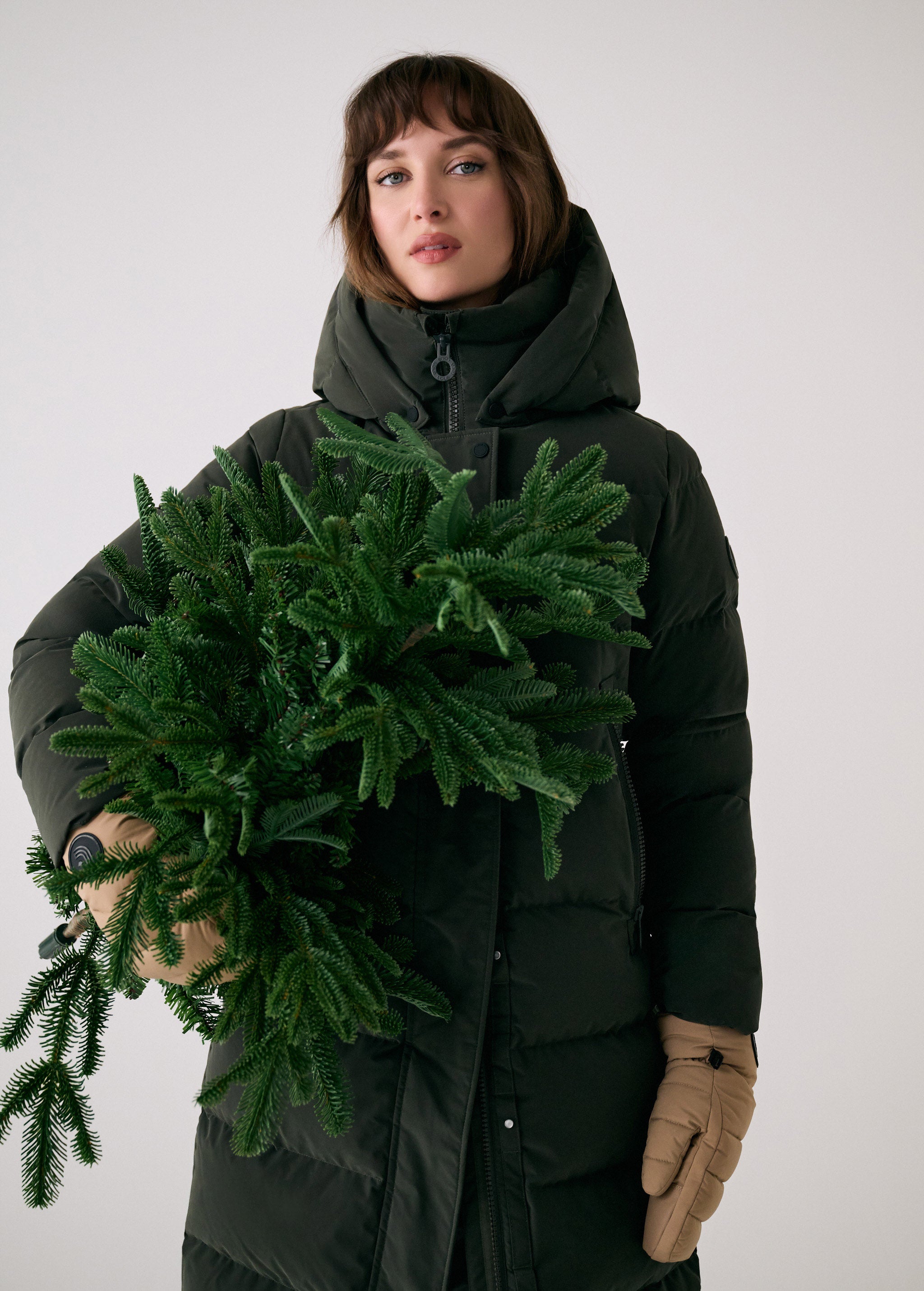 Lolë Après Down Winter Jacket in olive — achieve full-body warmth with this longline city jacket