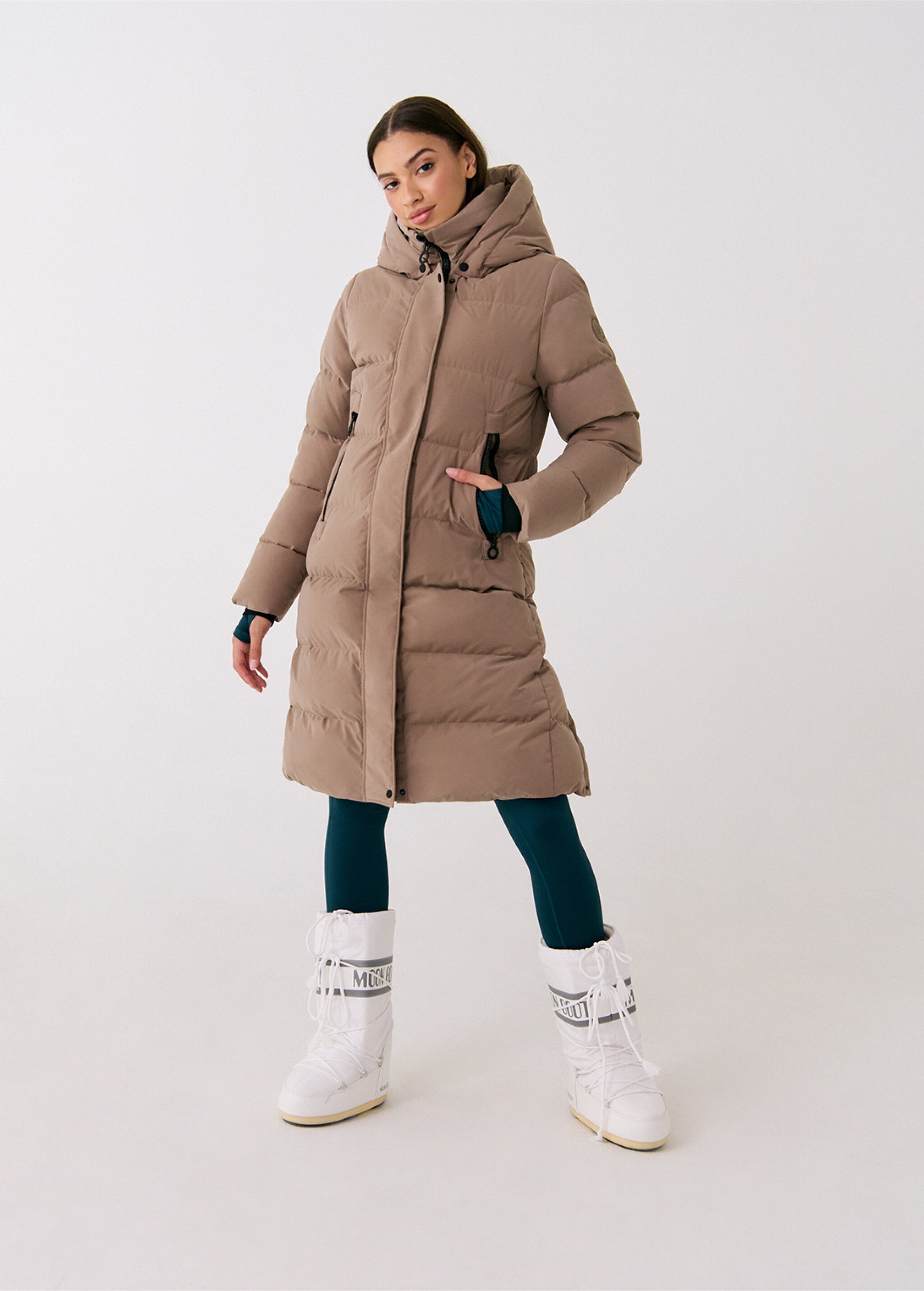 Lolë Après Down Winter Jacket in Fossil taupe — achieve full-body warmth with this longline city jacket
