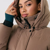 Lolë Après Down Winter Jacket in Fossil taupe — achieve full-body warmth with this longline city jacket