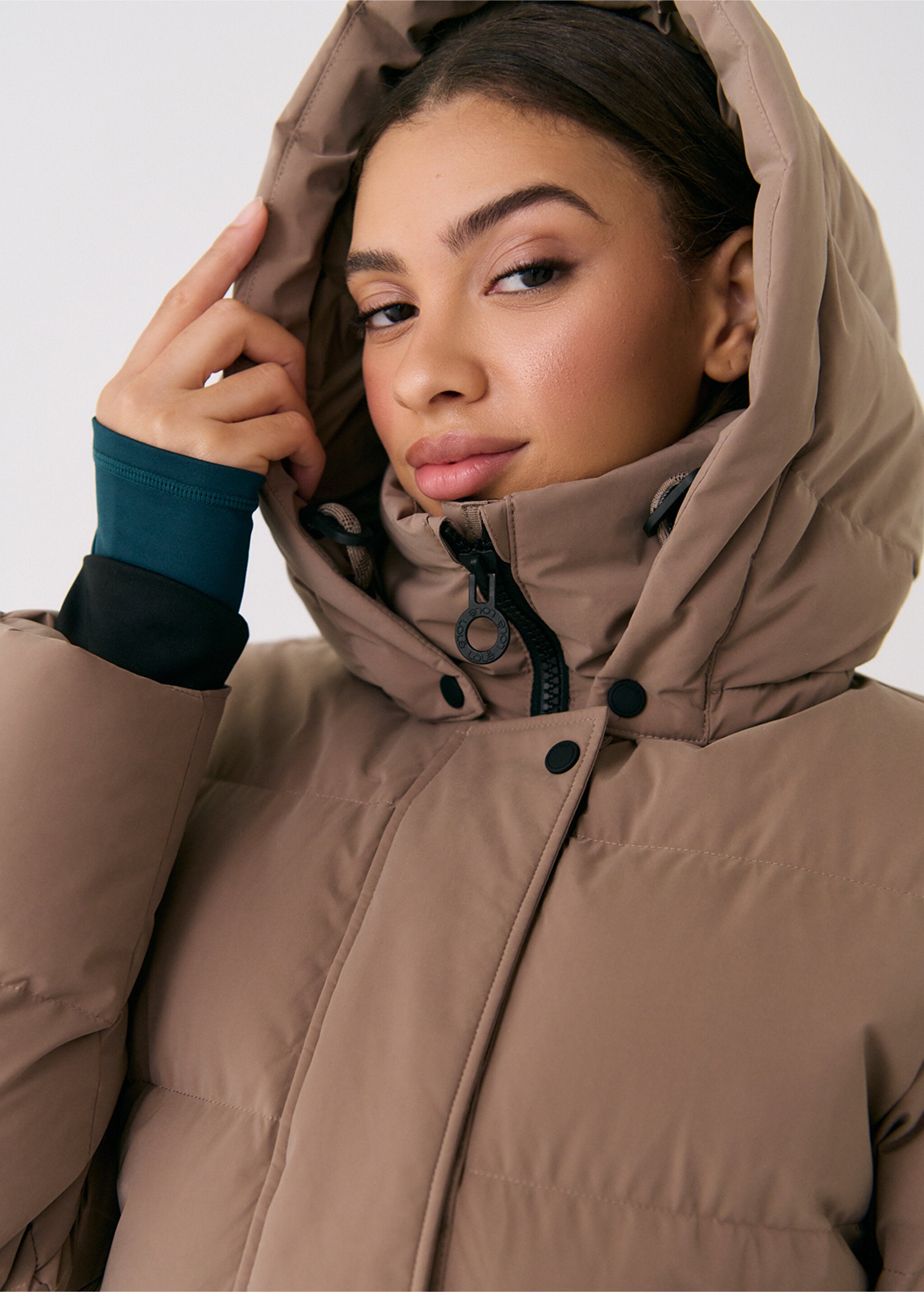Lolë Après Down Winter Jacket in Fossil taupe — achieve full-body warmth with this longline city jacket