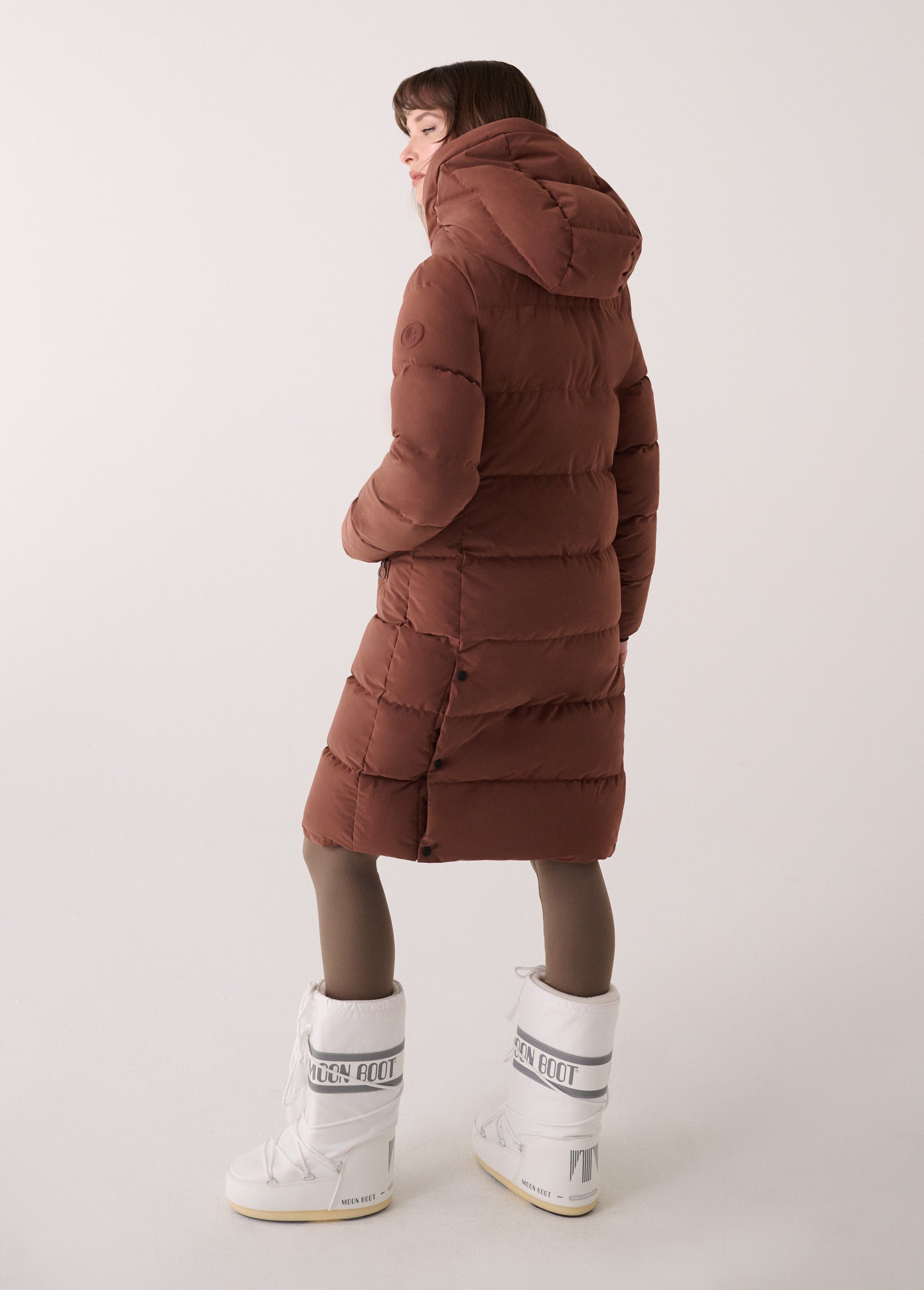 Lolë Après Down Winter Jacket in Sienna brown — achieve full-body warmth with this longline city jacket
