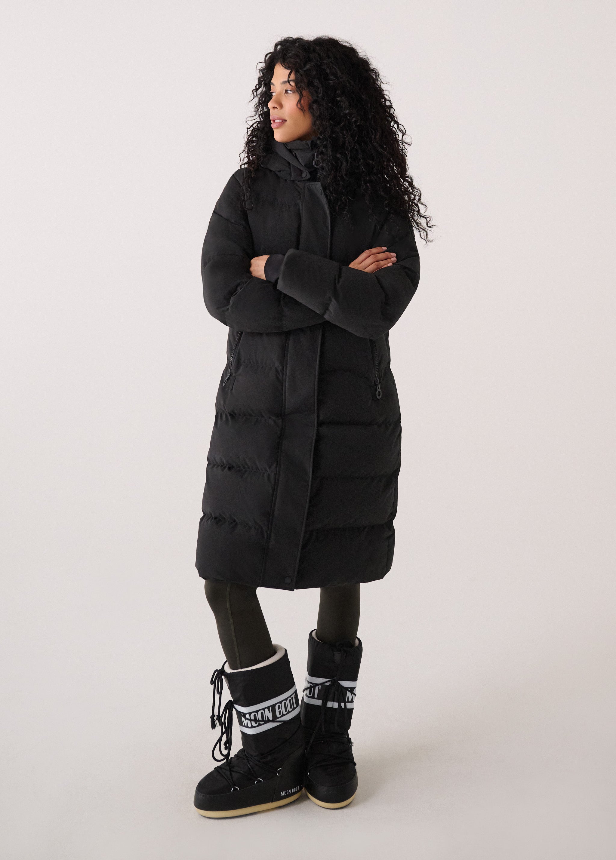 Lolë Après Down Winter Jacket in black — achieve full-body warmth with this longline city jacket