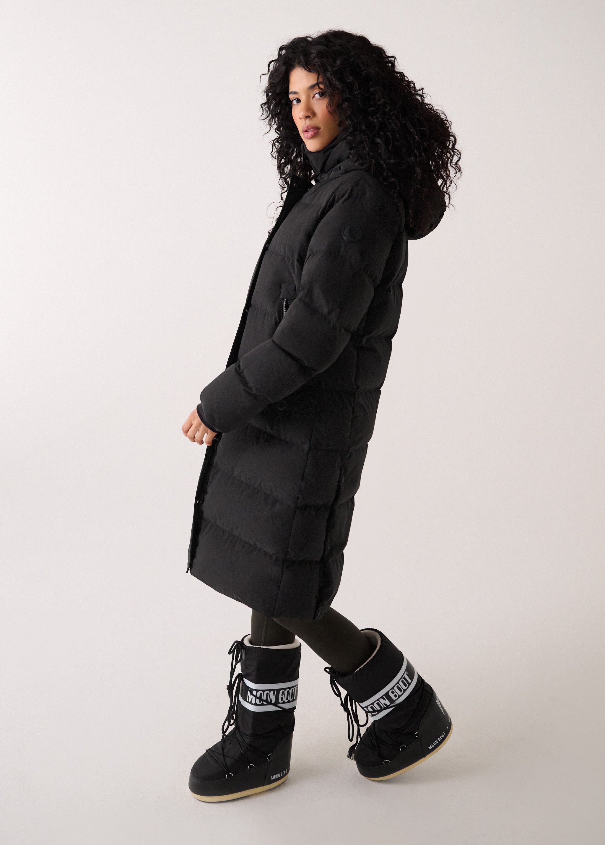 Lolë Après Down Winter Jacket in black — achieve full-body warmth with this longline city jacket