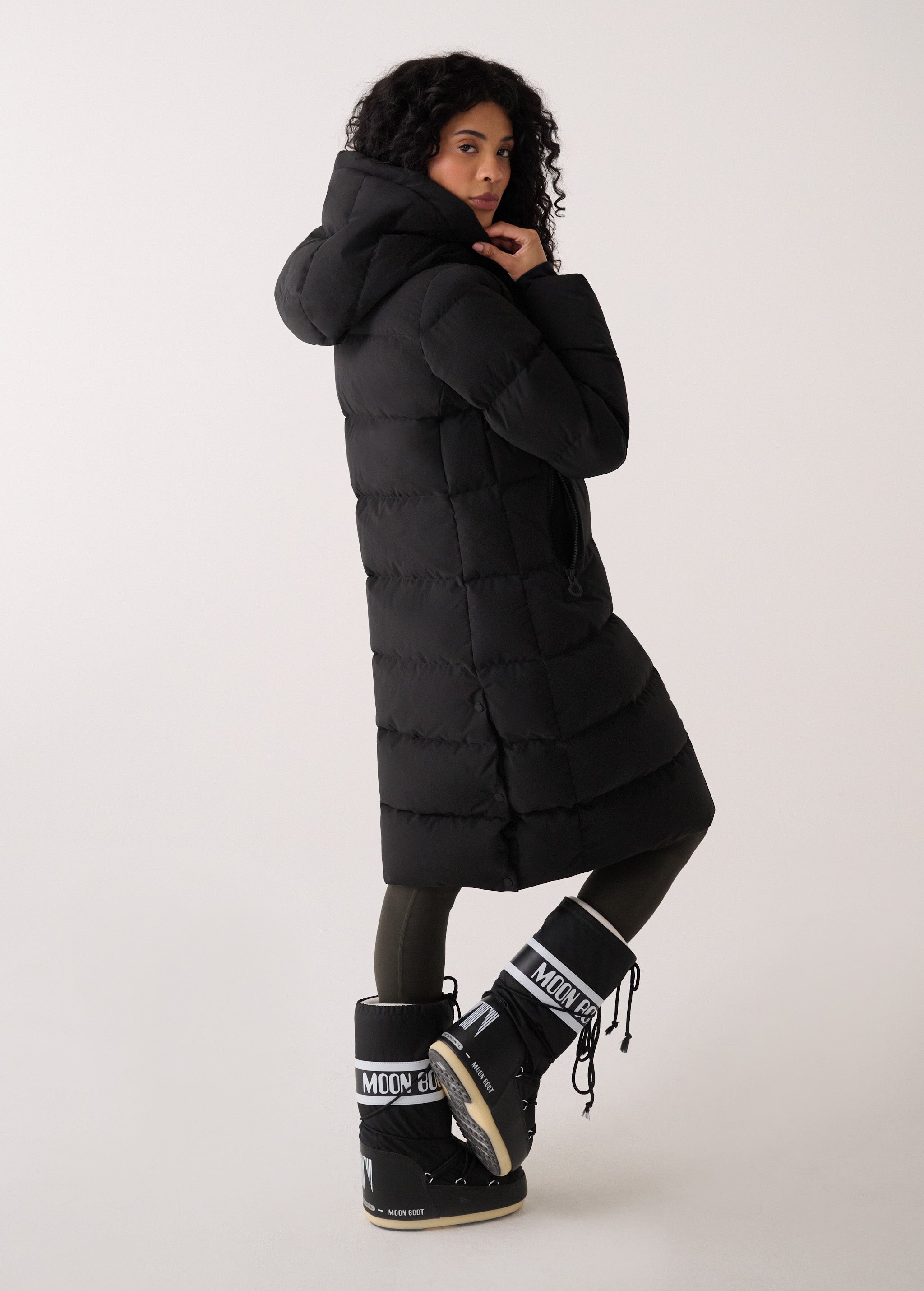 Lolë Après Down Winter Jacket in black — achieve full-body warmth with this longline city jacket